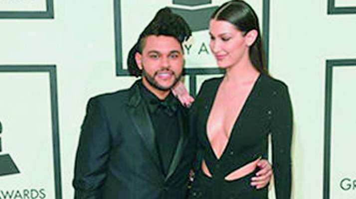 Bella Hadid and The Weeknd kiss in cannes