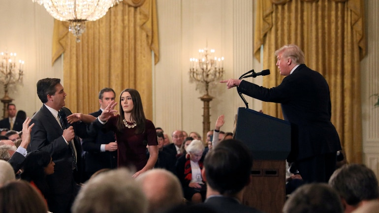 CNN sues White House for barring reporter Jim Acosta following heated exchange with Trump