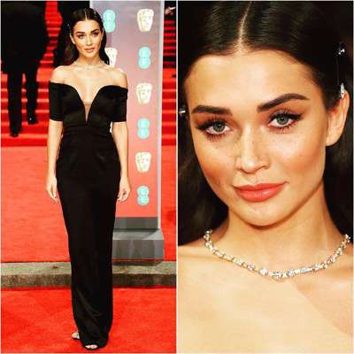 Amy Jackson spells magic with her slick low neck gown at BAFTA 2018