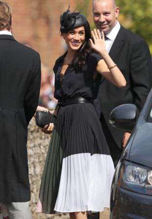 Meghan Markle suffers wardrobe malfunction at a family friend’s wedding